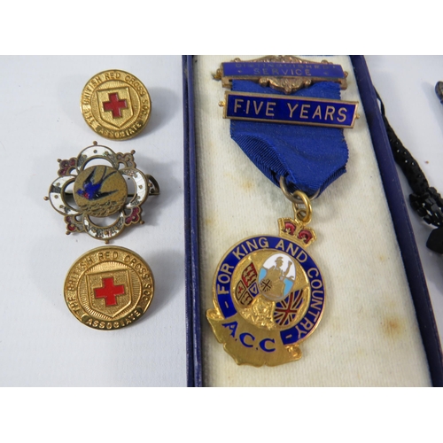 773 - Mixed lot to include enamel badges, distinguished service medal, whitby jet ? Albert chain etc.