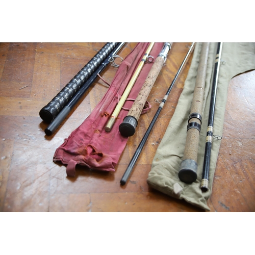 877 - Three Fishing rods with cases. See photos.