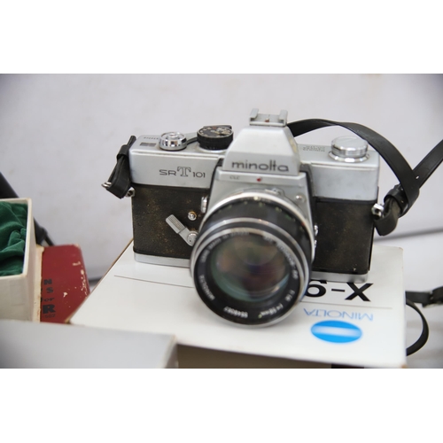 881 - Vintage Cameras to include Minolta, plus other photo items see photos.