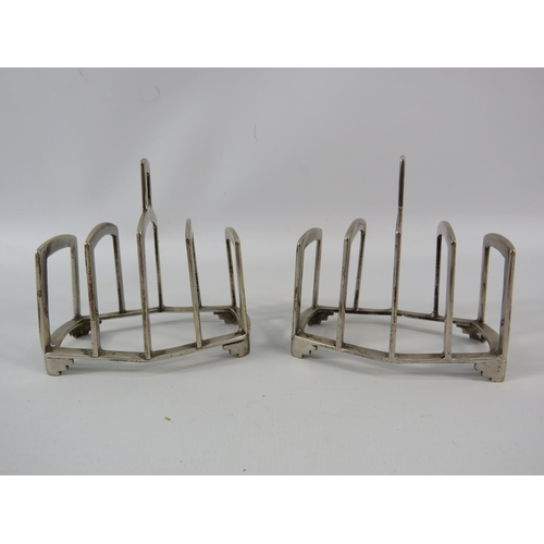 780 - Pair of Birmingham 1937 sterling silver toast racks, total combined weight 199 grams.