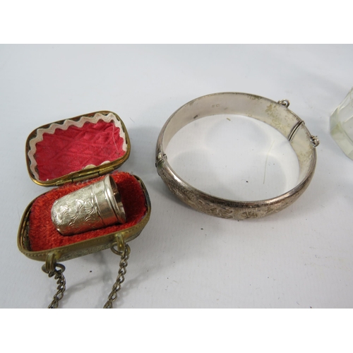 788 - Mixed sterling silver including Two Thimbles, bangle, sugar sifter etc, silver weight 44 grams.