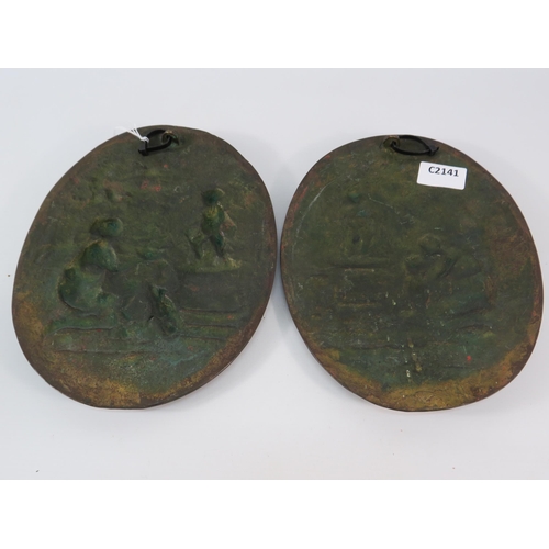 789 - Two Bronze alloy decorative wall plaques, 10