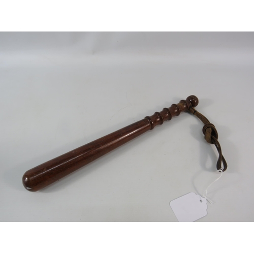 802 - 20th century policemans Truncheon with leather strap. 14 3/4