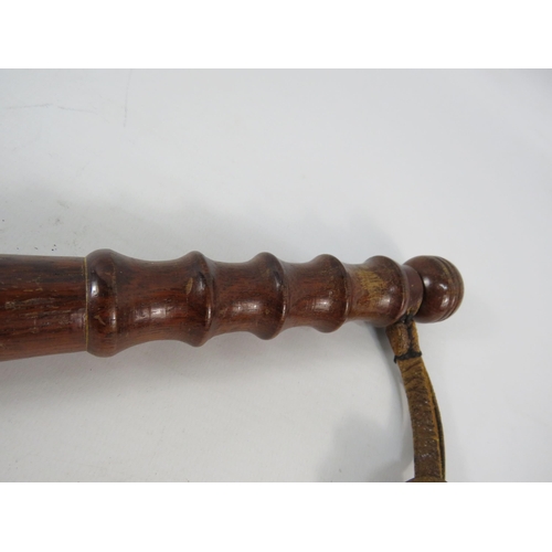 802 - 20th century policemans Truncheon with leather strap. 14 3/4