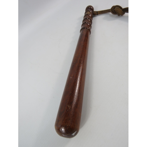 802 - 20th century policemans Truncheon with leather strap. 14 3/4