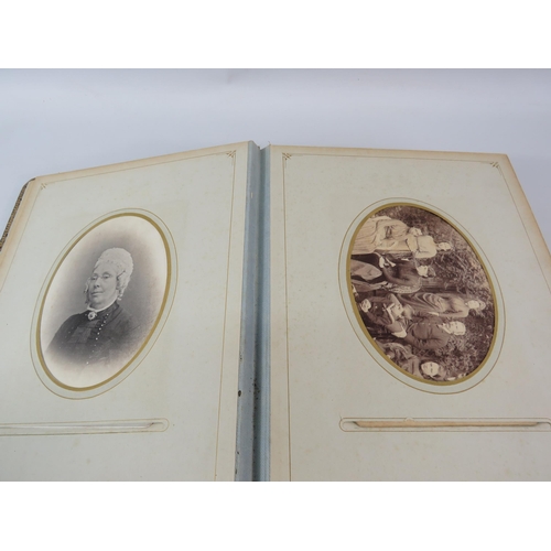 805 - Victorian photo album and photos within.