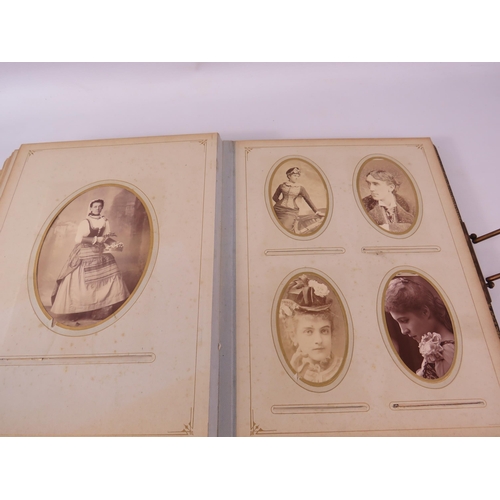 805 - Victorian photo album and photos within.