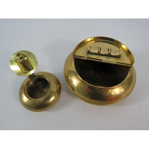 807 - Two brass travel ashtrays.