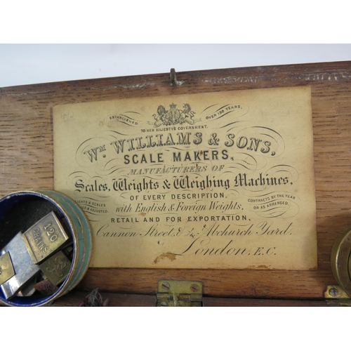 812 - Williams and Sons scales with various weights in original oak storage box.