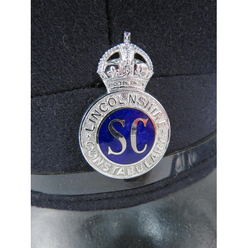 813 - Lincolnshire Constabulary Peak cap and lapel.