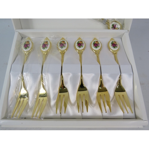 816 - Royal Albert old country roses gold plated cake forks and slice, boxed.