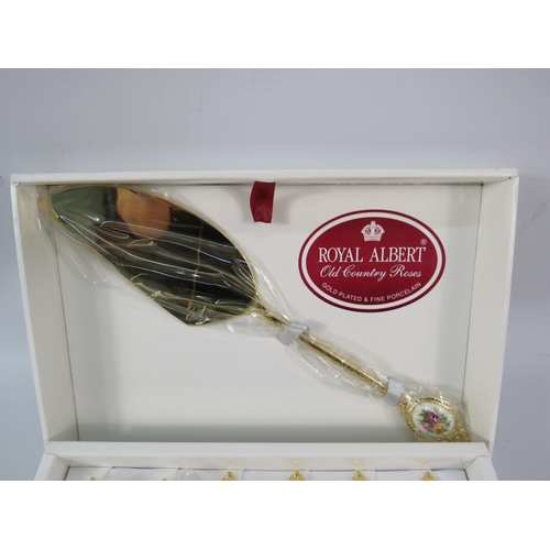 816 - Royal Albert old country roses gold plated cake forks and slice, boxed.