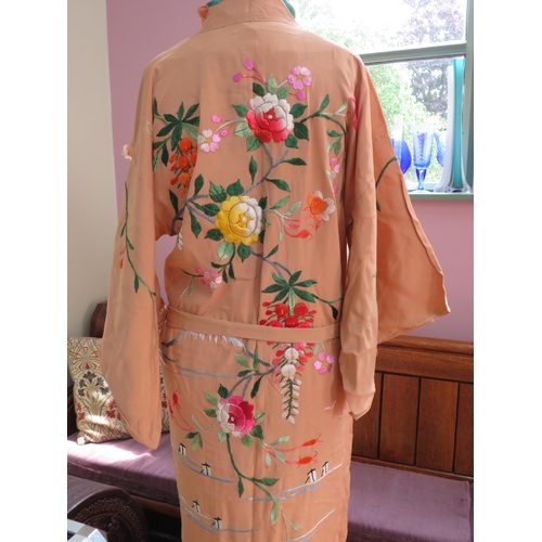 835 - A four piece oriental silk embroided kimono pyjama set imported in the 1960s and a feather fan.