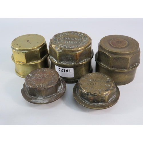 848 - Five brass carriage axel caps.