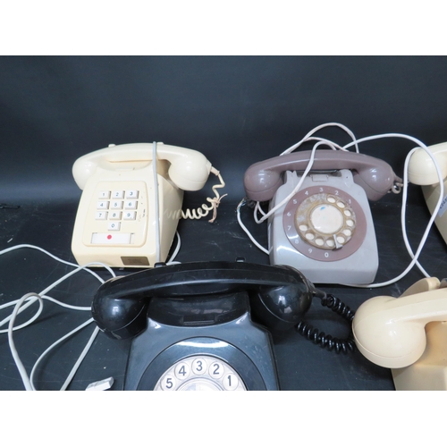 874 - Five vintage telephones.