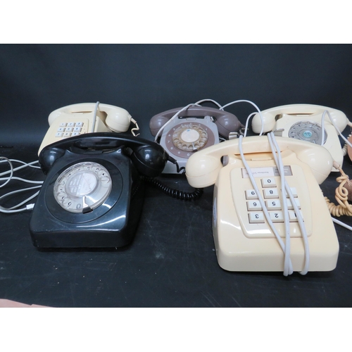 874 - Five vintage telephones.