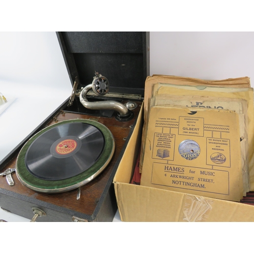 875 - Apollo table top gramophone in working order with a selection of records.