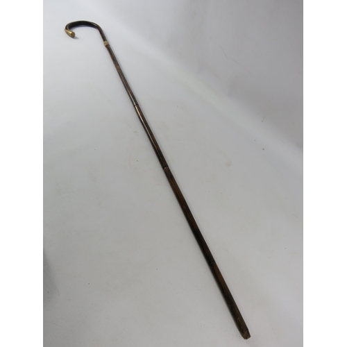 323 - Antique wooden cane with gold collar and end appears to be marked 18ct, 33 1/4