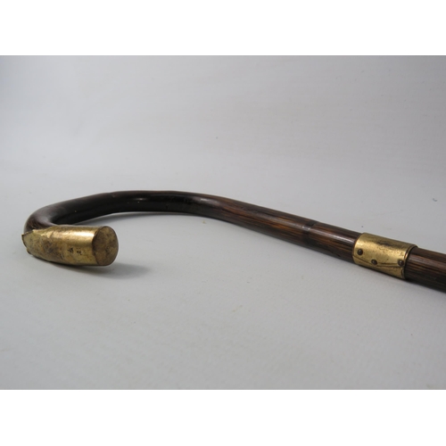 323 - Antique wooden cane with gold collar and end appears to be marked 18ct, 33 1/4