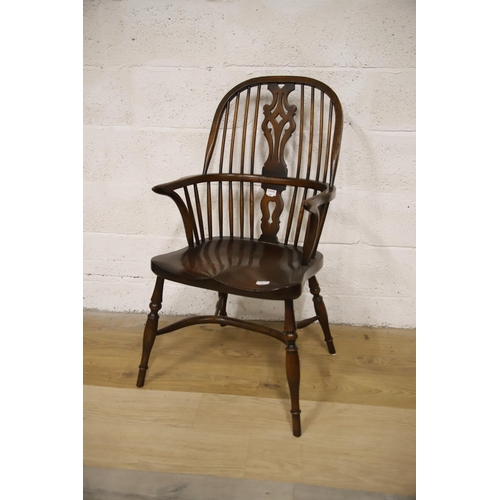 1224 - Very Pretty wheelback chair with  Crinoline Stretcher and swept back arms. Very good condition.