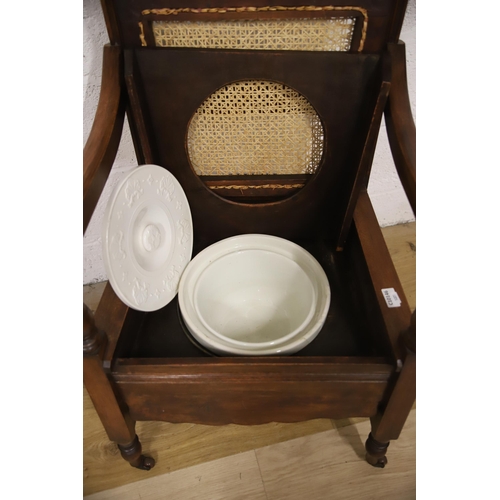 1225 - Antique Oak Commode Chair with Bergere seat. Original ceramic lidded pot to seat. Make great indoor ... 