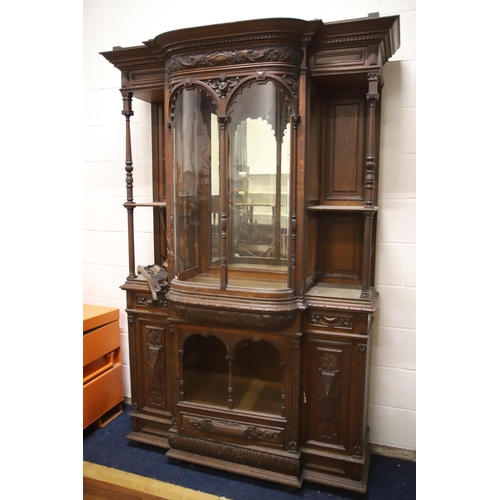 1229 - Large Imposing Victorian era dresser/display cabinet with curved float glass to top. Heavily carved ... 