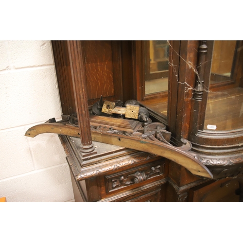 1229 - Large Imposing Victorian era dresser/display cabinet with curved float glass to top. Heavily carved ... 