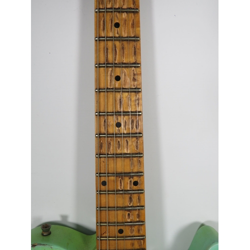 2001 - Copy of a 1960's era Fender Telecaster in aged Surf Green, with lots of superficial  wear, some wear... 