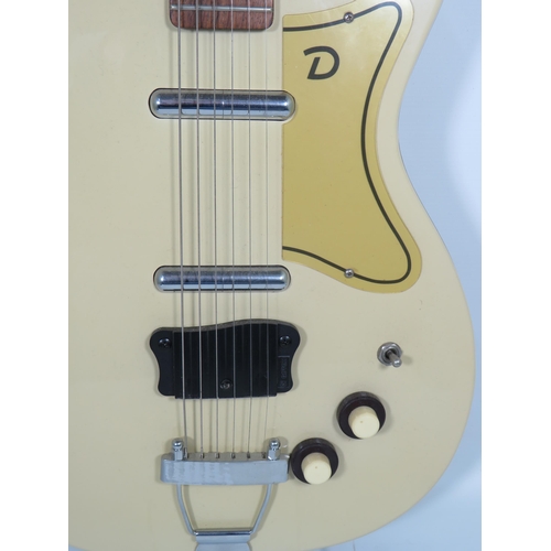 2006 - Vintage Danelectro Solid body electric Guitar in very good condition and finished in Grained Ivory/C... 