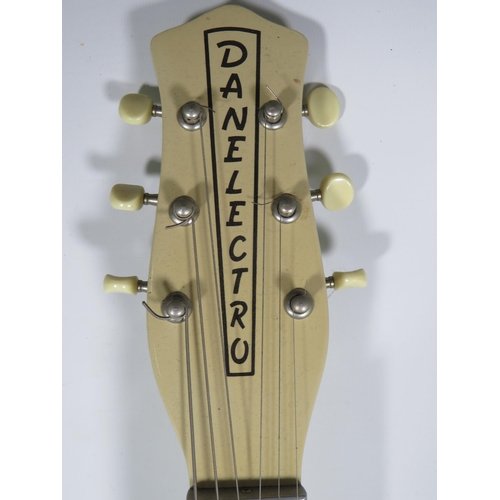 2006 - Vintage Danelectro Solid body electric Guitar in very good condition and finished in Grained Ivory/C... 