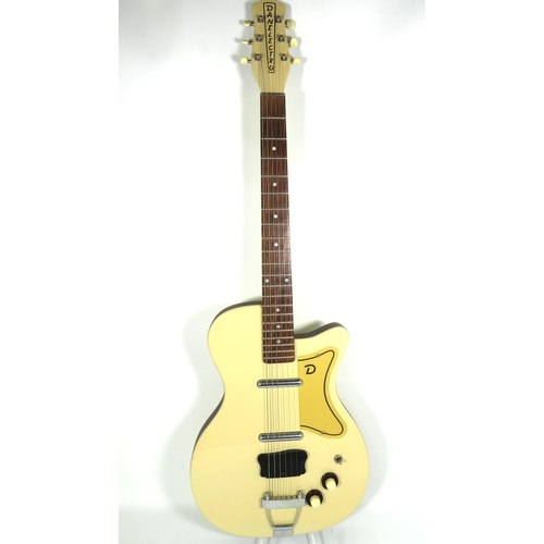 2006 - Vintage Danelectro Solid body electric Guitar in very good condition and finished in Grained Ivory/C... 