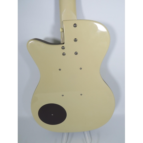 2006 - Vintage Danelectro Solid body electric Guitar in very good condition and finished in Grained Ivory/C... 