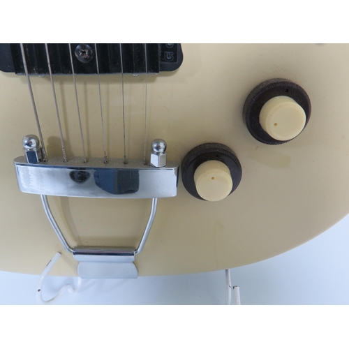 2006 - Vintage Danelectro Solid body electric Guitar in very good condition and finished in Grained Ivory/C... 