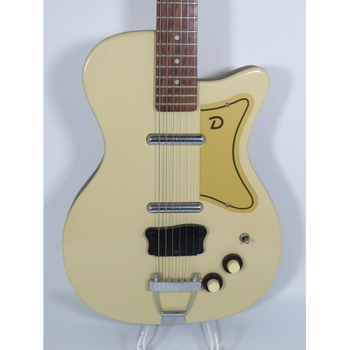 2006 - Vintage Danelectro Solid body electric Guitar in very good condition and finished in Grained Ivory/C... 