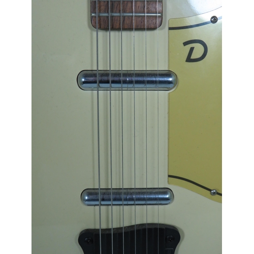 2006 - Vintage Danelectro Solid body electric Guitar in very good condition and finished in Grained Ivory/C... 