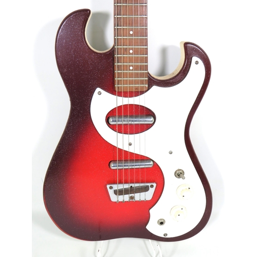 2007 - Vintage Silvertone Sunburst 1457 in Red Sparkle Finish and cream textured edge to body. Some Minor e... 