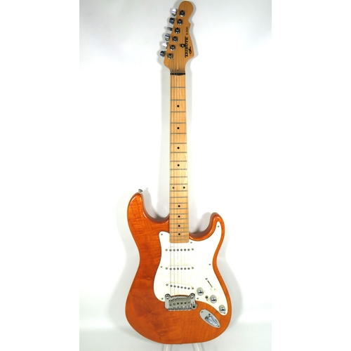 2010 - G&L Tribute S-500 Vintage electric Guitar finished in Gloss Amber and woodgrain body. Little evidenc... 