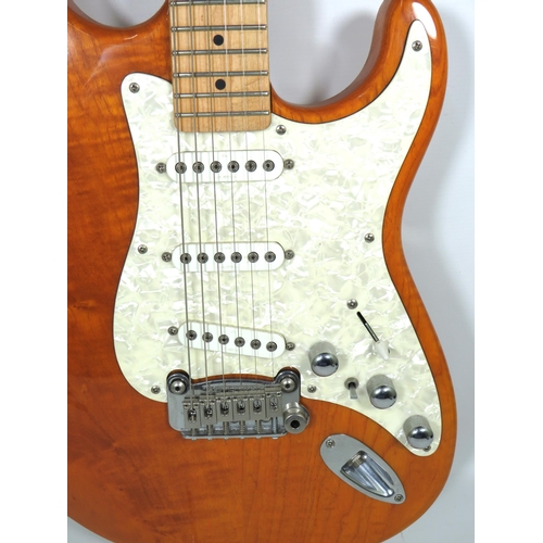 2010 - G&L Tribute S-500 Vintage electric Guitar finished in Gloss Amber and woodgrain body. Little evidenc... 