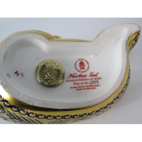 19 - Limited edition Royal Crown Derby Harbour Seal paperweight with gold stopper, 1079 of 4500.