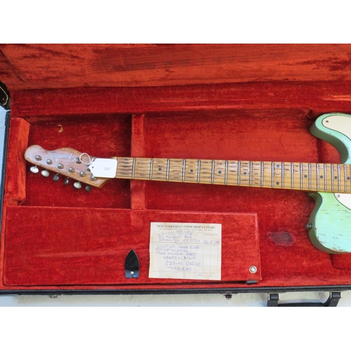 2001 - Copy of a 1960's era Fender Telecaster in aged Surf Green, with lots of superficial  wear, some wear... 