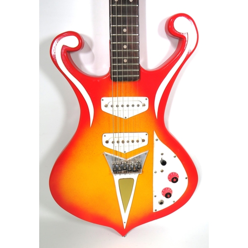 2025 - Solid Bodied Six String 'Music Man' Electric Guitar  in fair condition with light wear . .  41 inche... 