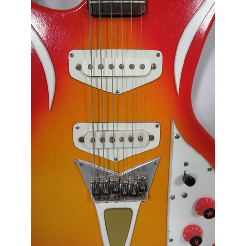 2025 - Solid Bodied Six String 'Music Man' Electric Guitar  in fair condition with light wear . .  41 inche... 