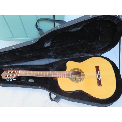 2042 - Lovely Accoustic Guitar by Grafter, The 'Cruiser' model. In lovely condition. Comes with hard carry ... 