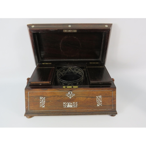 32 - A 19th Century rose wood & mother of pearl inlay tea caddy casket shape with glass bowl. 8