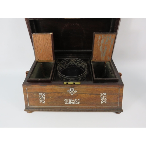 32 - A 19th Century rose wood & mother of pearl inlay tea caddy casket shape with glass bowl. 8