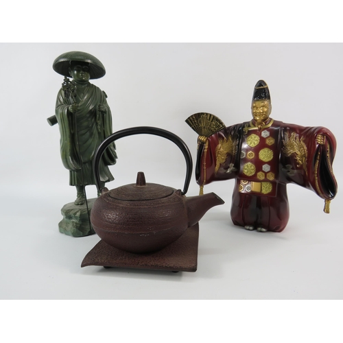 35 - Two heavy bronze alloy chinese figures and a teapot. The tallest stands 9 3/4