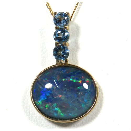 101 - 9ct Yellow Gold Pendant set with an oval Opal and Three Aquamarine coloured stones. Hung on a 9ct Ye... 