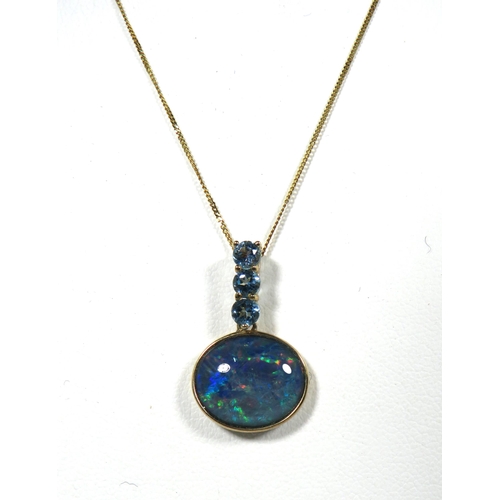 101 - 9ct Yellow Gold Pendant set with an oval Opal and Three Aquamarine coloured stones. Hung on a 9ct Ye... 