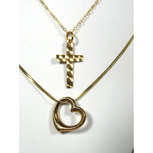 105 - 9ct Yellow Gold Crucifix plus a 9ct Yellow Gold heart shaped pendant each hung on 9ct chains. Total ... 