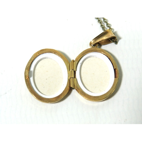 108 - 9ct Yellow Gold Locket which measures 20mm hung upon a 9ct Yellow Gold 20 inch chain. Total weight 3... 